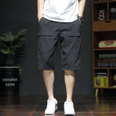 Threebooy Summer New Fashion Casual Versatile Loose Beach Shorts Men Elastic Waist Drawstring Pockets Big Size Sports Straight Short Pants