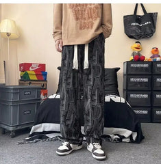Threebooy Fallen Letter Full Print Casual Pants for Men with a Straight Leg and Wide Leg Design Loose and Versatile Floor Length Pants