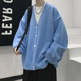 Threebooy Youthful and Trendy Men Spring and Autumn New Spliced V-neck Button Fashion Solid Color Loose Casual Long-sleeved Knitted Top