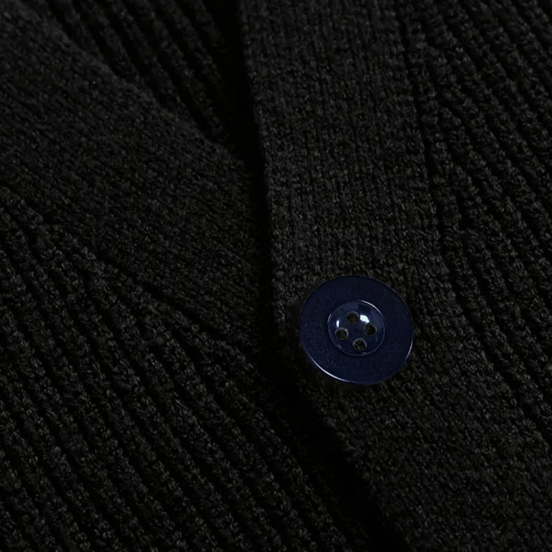 Threebooy  New Luxury Casual Men Sweater Vest Leisure Trendy Knit V Neck Button-down Solid Color Sleeveless Cardigan Retro Basic Waistcoats