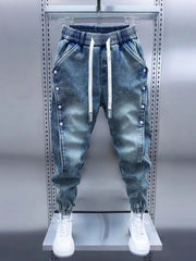 Threebooy  Light Blue Men's Jeans Elastic Waist Decorative Button Harlan Pants Spring Autumn Fashionable Slim Fit Harlan Trousers