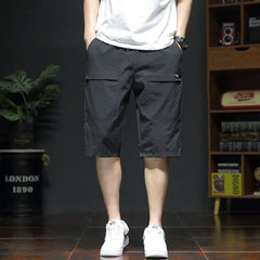 Threebooy  Summer New Fashion Casual Versatile Loose Beach Shorts Men Elastic Waist Drawstring Pockets Big Size Sports Straight Short Pants