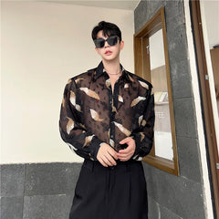 Threebooy Men Sexy Feather Hollowed Out Shirt Men's Lapel Long Sleeved Transparent Clothing Streetwear Casual Loose Trendy Design Tops