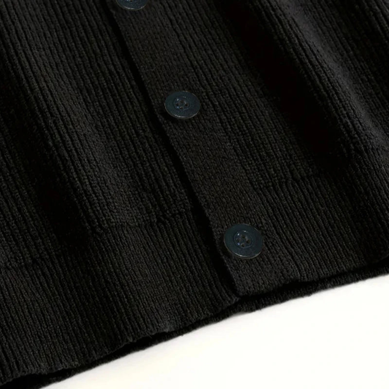 Threebooy  New Luxury Casual Men Sweater Vest Leisure Trendy Knit V Neck Button-down Solid Color Sleeveless Cardigan Retro Basic Waistcoats