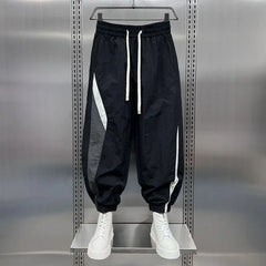Threebooy  Elegant Fashion Harajuku Slim Fit Ropa Hombre Casual All Match Sports Pants Stripe Patchwork Thin Style Pockets Harlan Pants