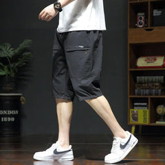 Threebooy  Summer New Fashion Casual Versatile Loose Beach Shorts Men Elastic Waist Drawstring Pockets Big Size Sports Straight Short Pants