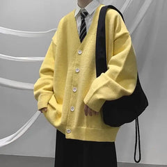 Threebooy Youthful and Trendy Men Spring and Autumn New Spliced V-neck Button Fashion Solid Color Loose Casual Long-sleeved Knitted Top