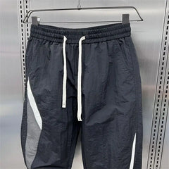 Threebooy  Elegant Fashion Harajuku Slim Fit Ropa Hombre Casual All Match Sports Pants Stripe Patchwork Thin Style Pockets Harlan Pants