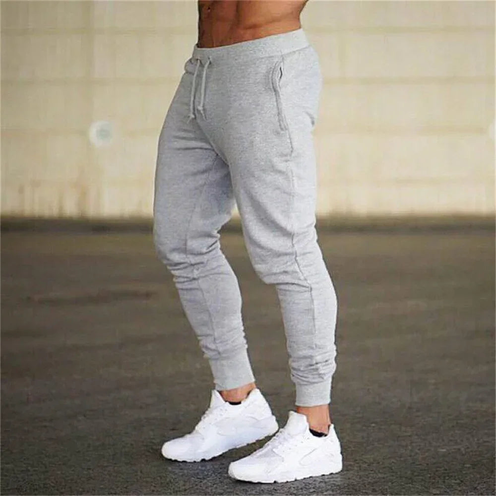 Threebooy New Fashion Men Gyms Solid Pants Joggers Fitness Casual Long Pants Men Workout Skinny Sweatpants Jogger Tracksuit Trousers