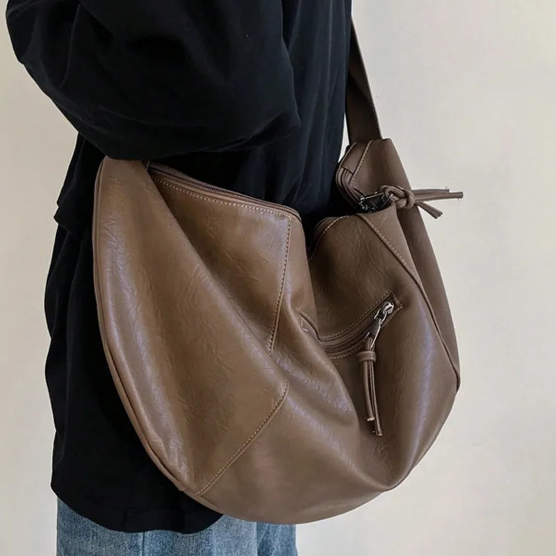 Threebooy Stylish Dumpling Shaped PU Crossbody Bag for Men, Suitable for Casual Outings and Large Capacity Needs