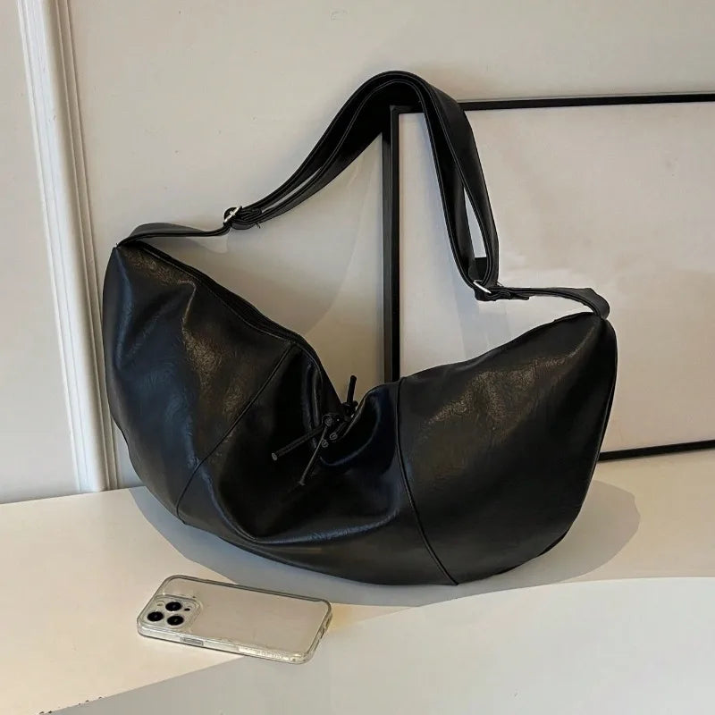 Threebooy Stylish Dumpling Shaped PU Crossbody Bag for Men, Suitable for Casual Outings and Large Capacity Needs