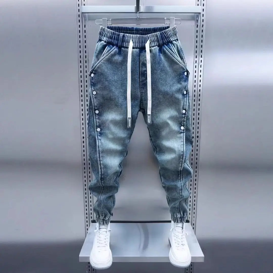 Threebooy  Light Blue Men's Jeans Elastic Waist Decorative Button Harlan Pants Spring Autumn Fashionable Slim Fit Harlan Trousers